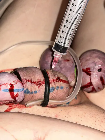 My cock and balls being prepared for cutting away