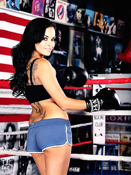 Sexy latina Daisy Marie shows her hairless snatch and perfectly