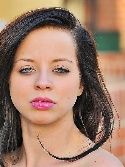 Lovely brunette lifts up her legs and teases her pussy for the c