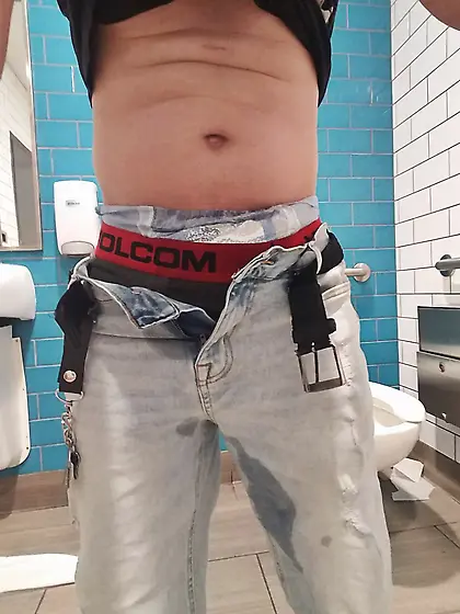 young twink with soaked pull-up shows off in publi