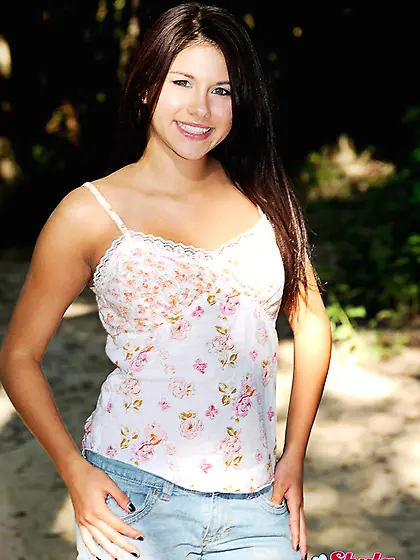 Seductive teen hottie Shyla Jennings strips in the woods and pla