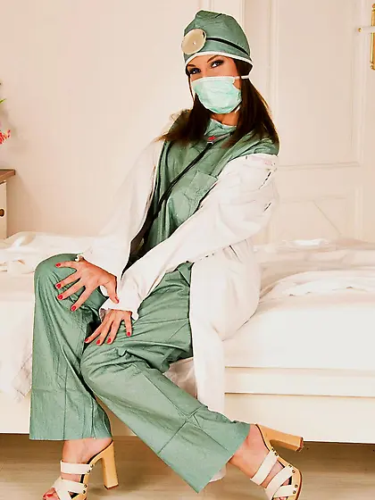 Sexy lady doctor Lauren May takes off her uniform then fingers h