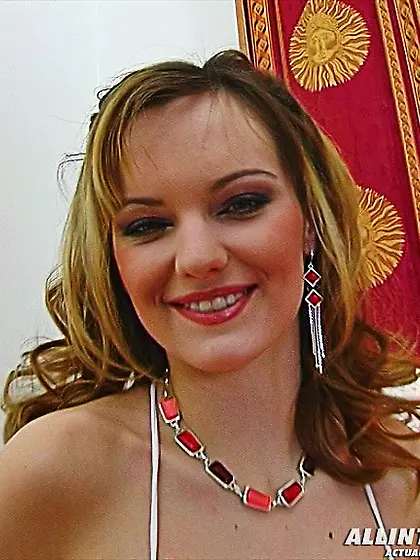 Blonde sexily strips naked