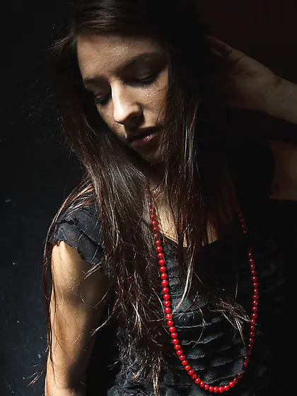 Beautiful teen sits fire