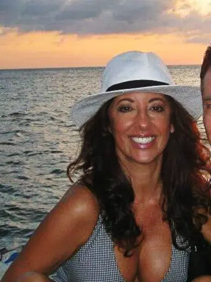 Virginia strikes a pose while showing her tits