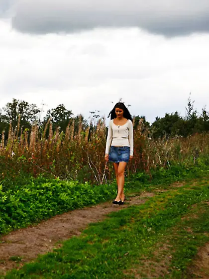 Babe tinkles on a road in the middle of a...