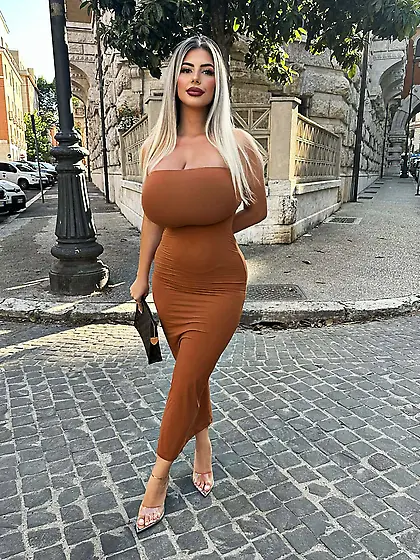 Italian blonde with huge tits