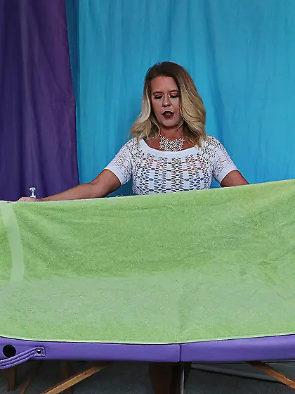 Grace Evangeline gives two hung men a handjob at the same time