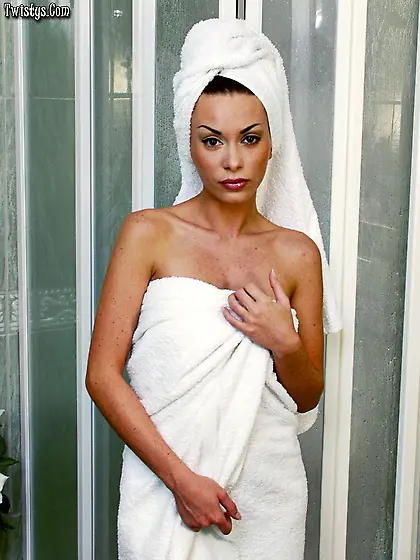 Jill plays in the bathroom,  she's stroking her wet tattooed body