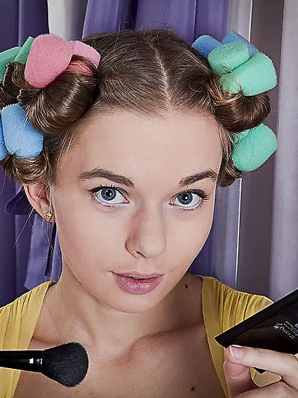 Teen chick undresses and stimulates clit of bushy pussy while pi