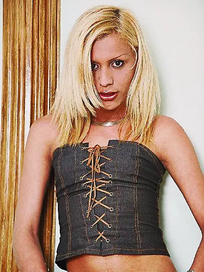 Tgirl in a corset jerking off