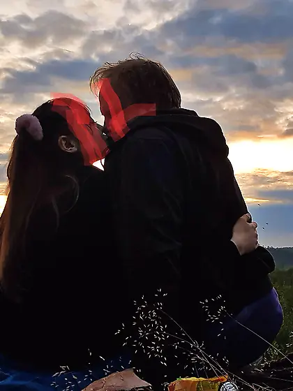 Dad & Daughter kissing outdoors