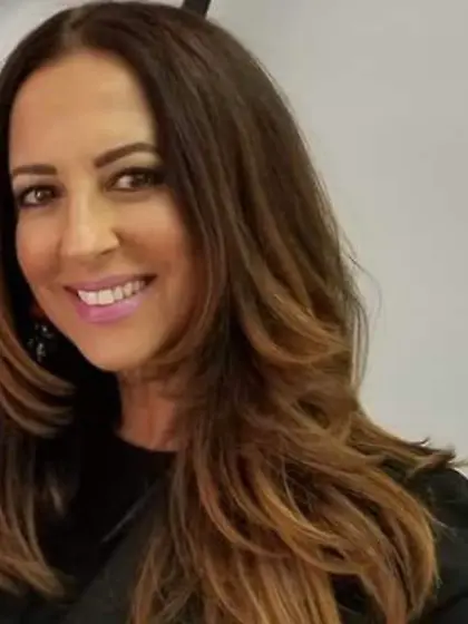 Virginia strikes a pose while showing her tits