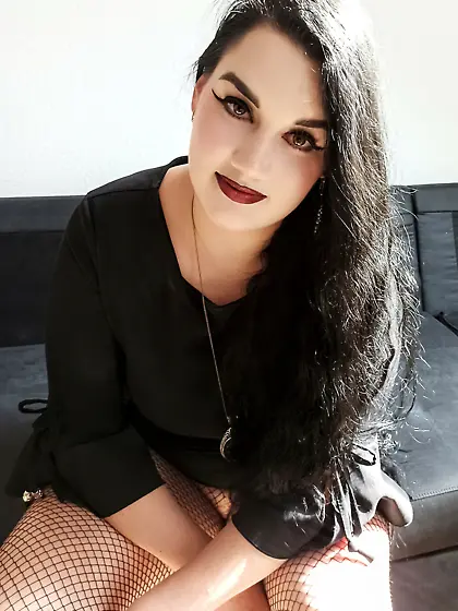 gothic girl in fishnet pantyhose