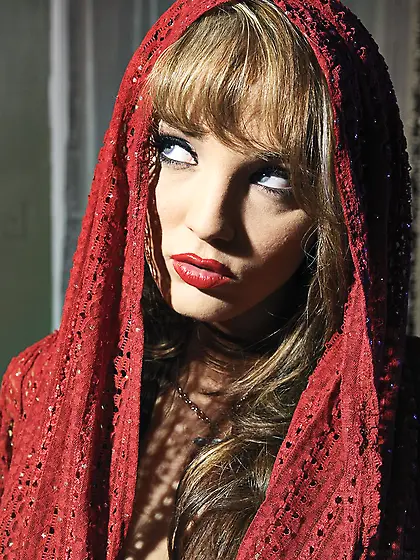 Hot busty blonde Charlie Laine strips her thongs and shows her f