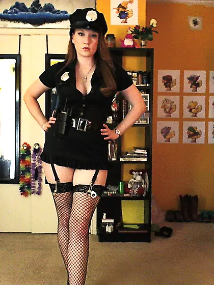 Filthy redhead Lucy OHara is a police officer in sexy uniform an