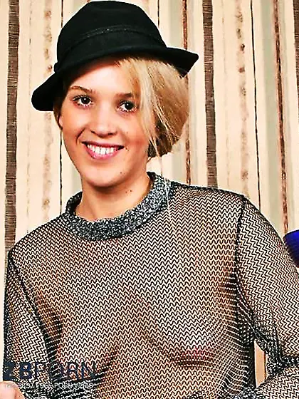 Nymphs sans brassiere under sheer half-shirt