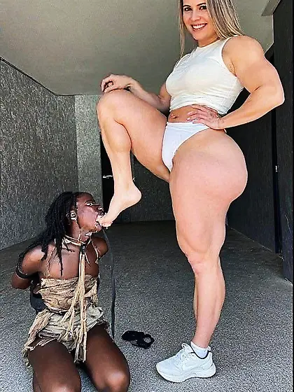 Sexy White Milf Makes Nigger Worship Feet