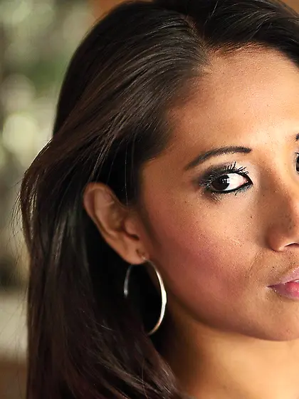 Brunette beauty shows her clean-shaven cunt in a solo gallery