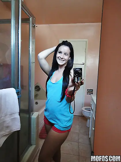 Brunette girl decides to take some spicy pics of herself in the