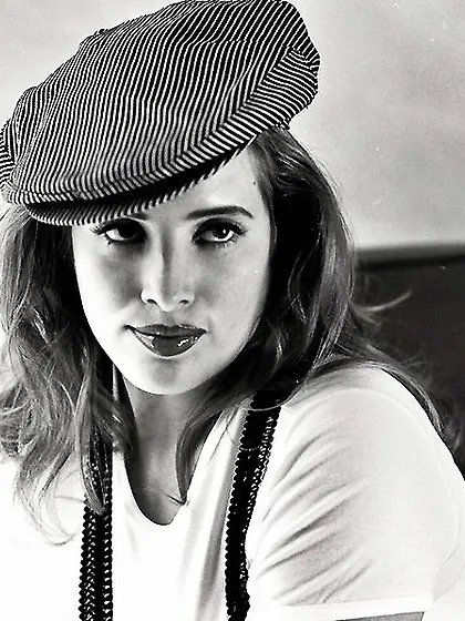 Busty girl suspenders stretches