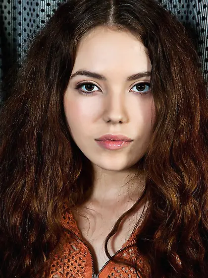 The brunette teen Norma Joel is spreading her legs showing how s