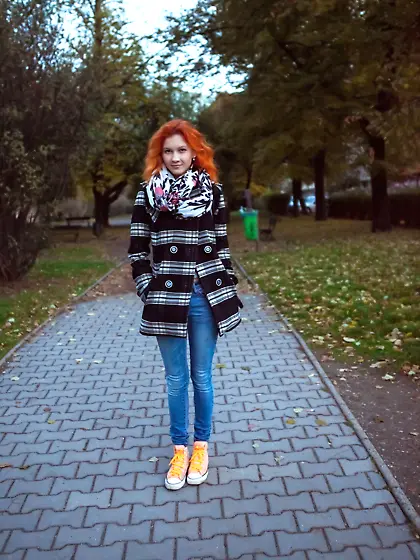 Redheaded babe Ambre removes her clothes and poses nude