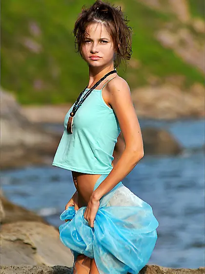 Posing by the sea makes Irma B just want to take her clothes off