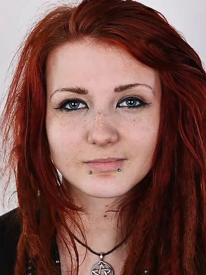 Enthralling redhead black top