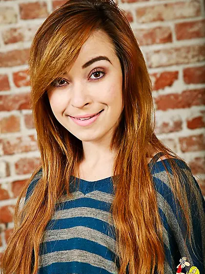 Perky redhead bares cock