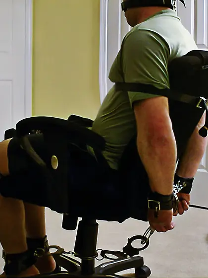 Tied husband in pantyhose