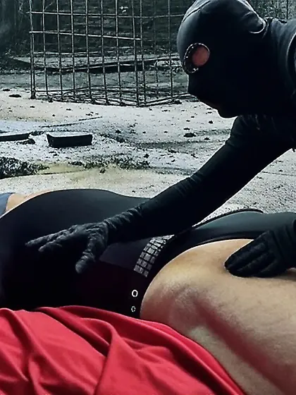 Black Superhero captured in netting.  KO and fondle