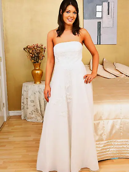 Kelly M removes her white wedding dress then displays her big bo