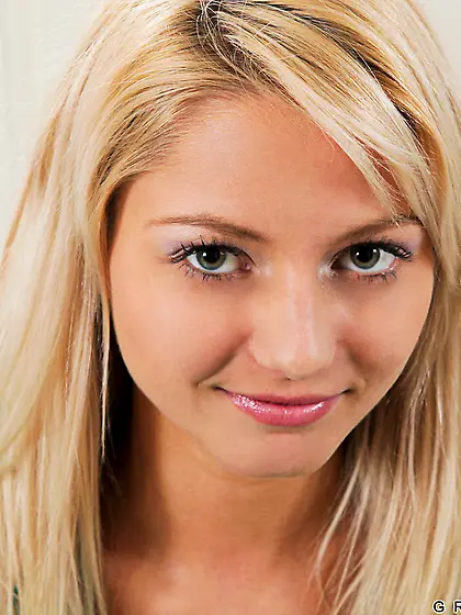 Hot blonde gal Pinky June strips on the bed and then toys her fu