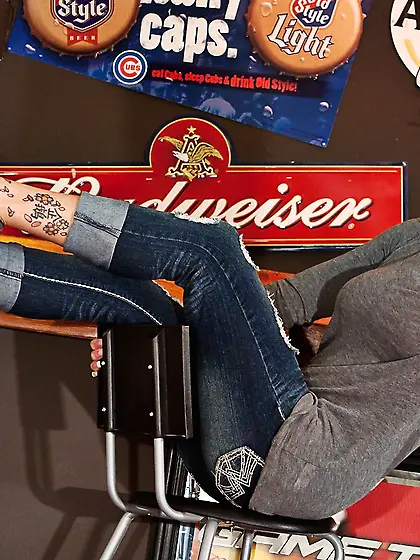 Alluring brunette model Nikki Sims strips her blue jeans and sho