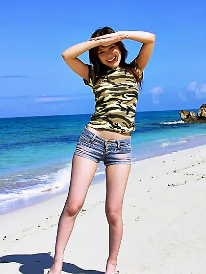 Teen babe Yua Aida got out to the beach and excitingly undressed