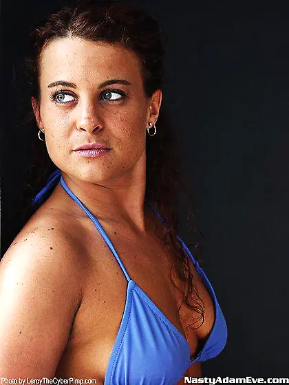 Curly-haired temptress takes blue