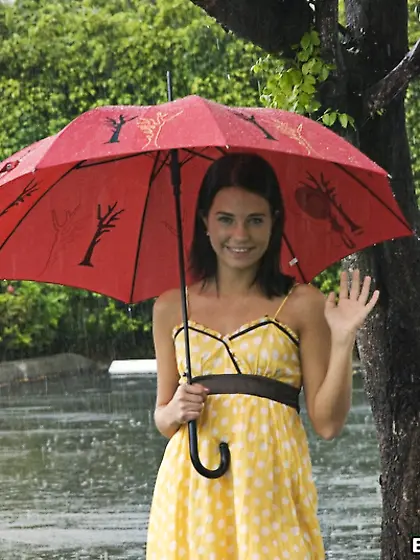 Brandi Belle takes her pink dress in front of the camera and get