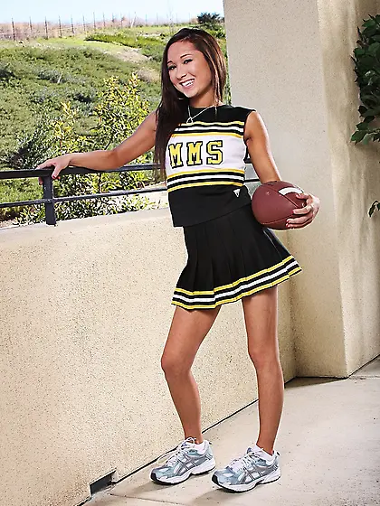 Petite cheerleader Jesse Jordan with beautiful smile on her cute