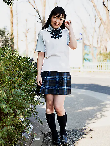 Japanese schoolgirl raises miniskirt