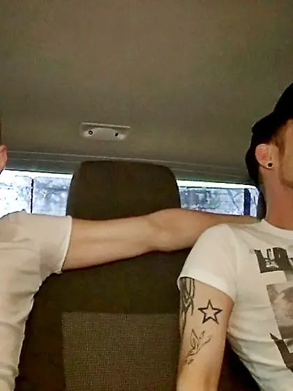 Pierced guy red suit