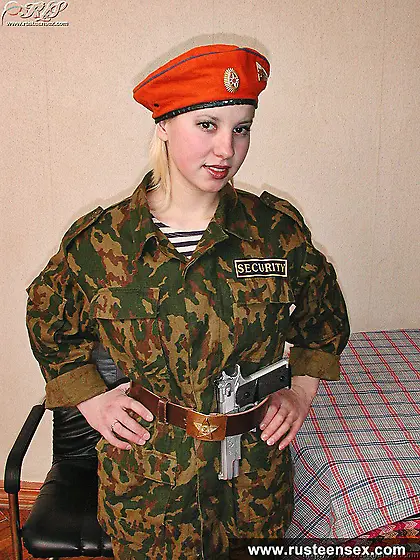 Russian teen in military uniform masturbates with dildo