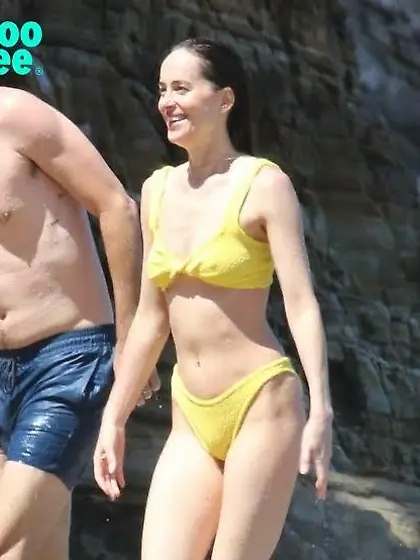 Dakota Johnson in a yellow bikini