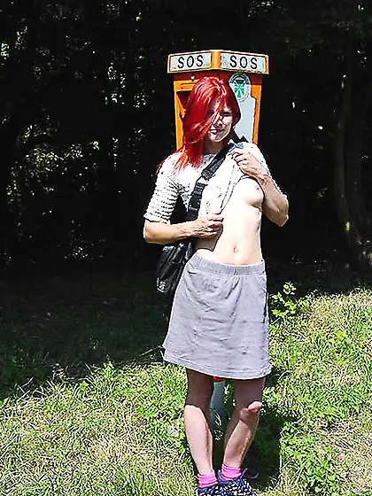 Sexy shaped redhead bimbo