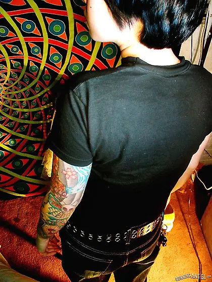 Oriental teen flashes her tattoos all over the petite body in cl