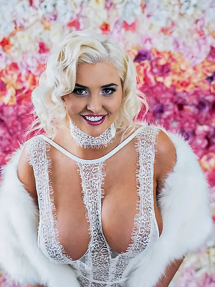 Karissa Shannon smiles while riding lover's cock