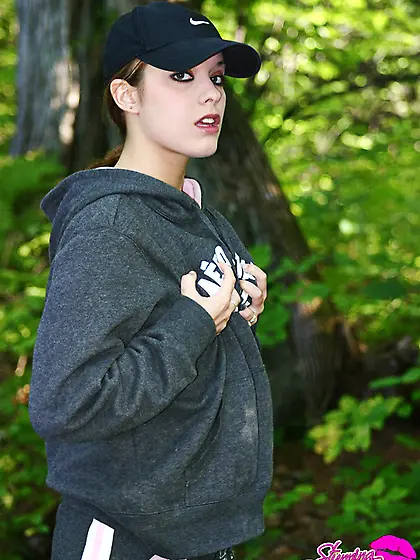 Stunning Serena goes for a walk in a local forest to pose naked