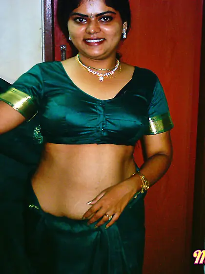 Neha in traditional green saree stripping...
