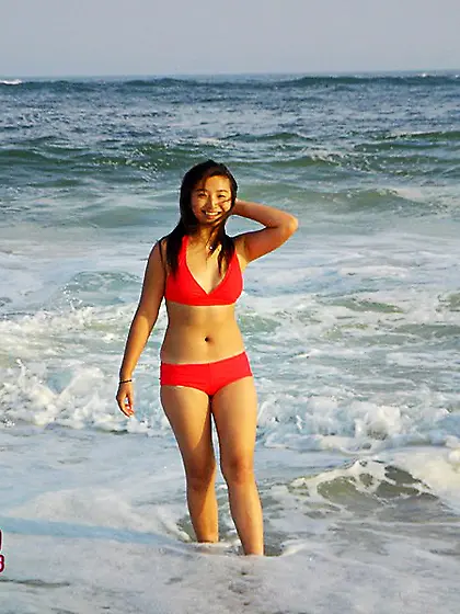 Asian girlfriend tastes the