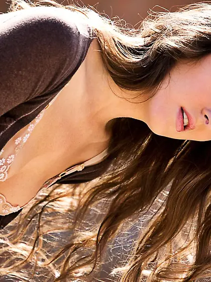 Seducing bimbo Coco Rose is stripping and uncovering legs demons